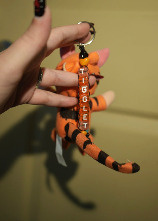 “tigglet” bag charm 🐖🐅🔗